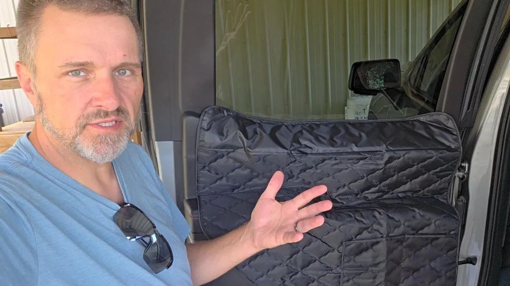 ryan gesturing installed dog door cover sierra