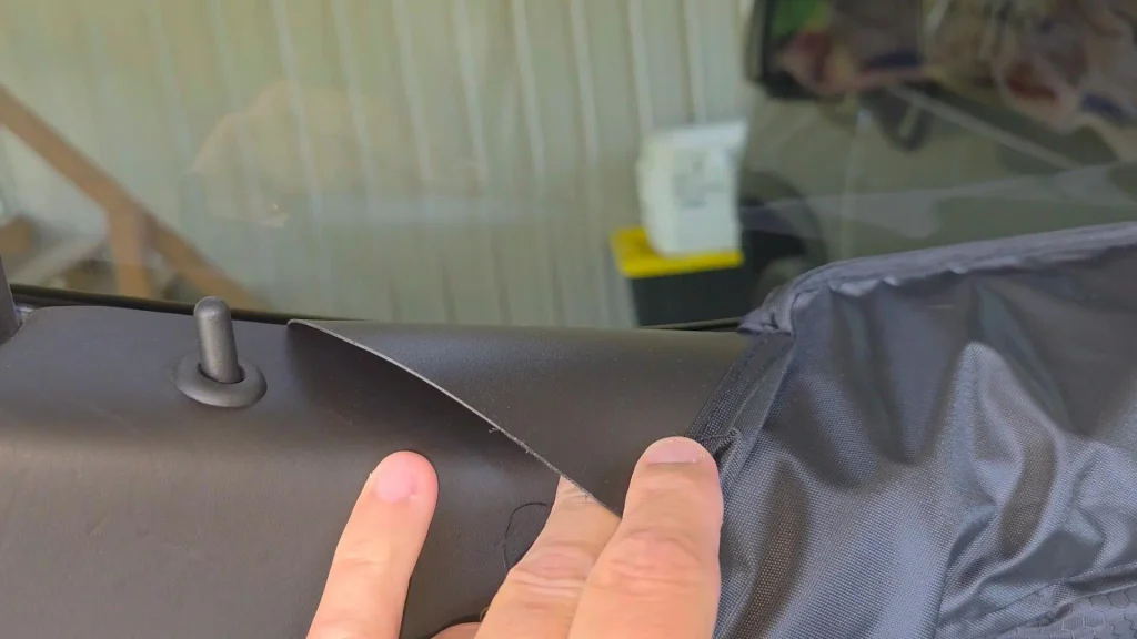 velcro windowsill tab at lock pin closeup