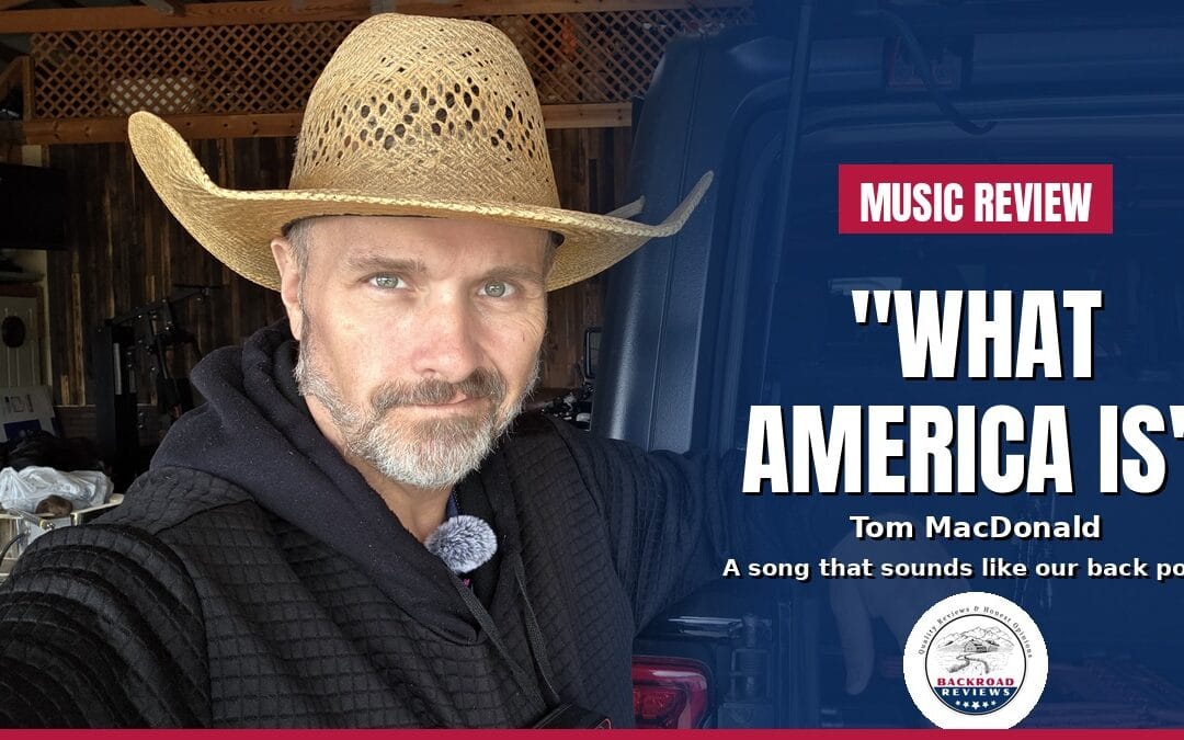 Ryan from Backroad Reviews in a straw cowboy hat leaning on his Jeep, next to the text "Music Review: What America Is, Tom MacDonald.