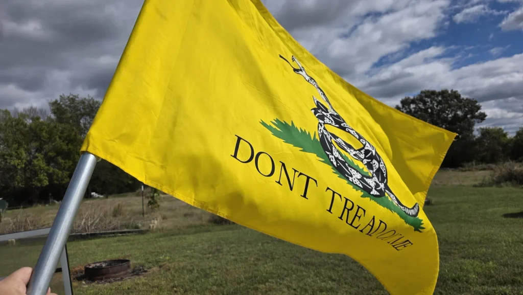yellow flag over fire pit yard